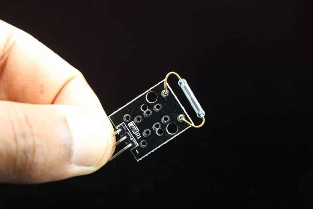 A tiny magnetic reed switch module
