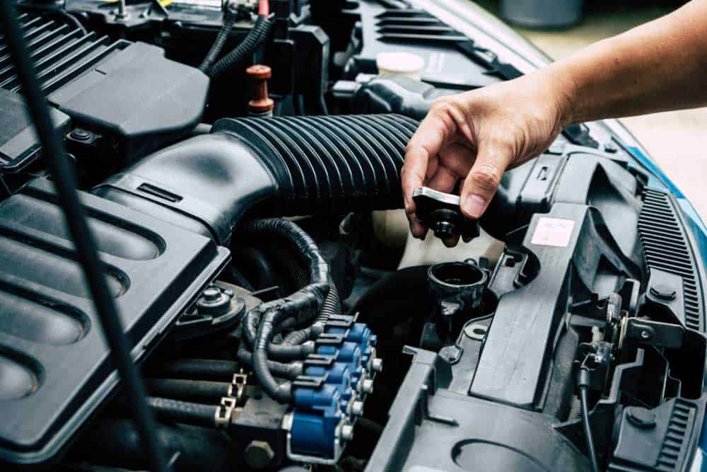 Checking a car radiator.