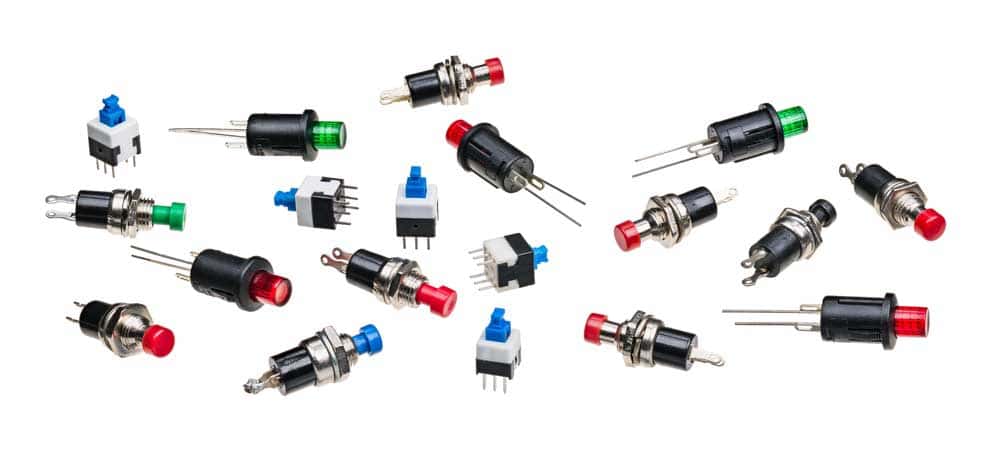 Various push button switches with their contact pins