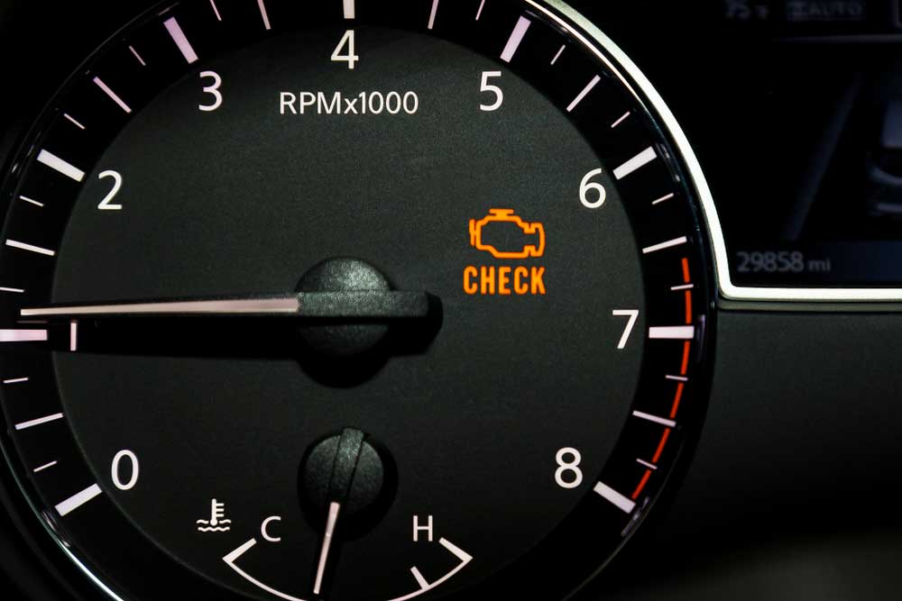 An illuminated check engine warning light