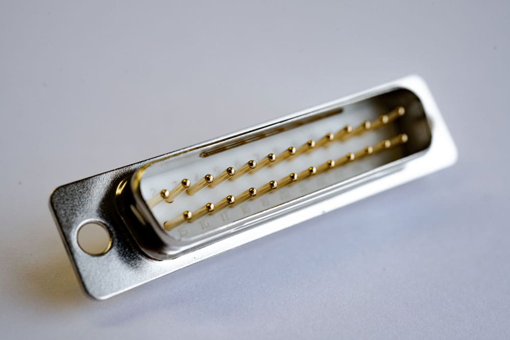 A D-sub connector (note the D-shaped metal shield around the pins)