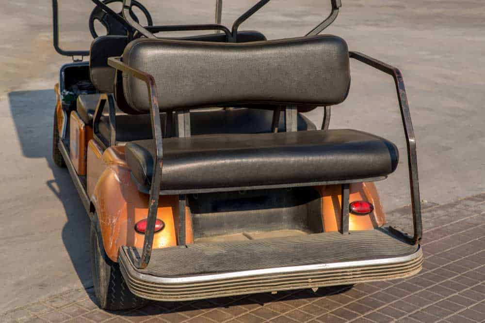 A golf cart’s tail lights