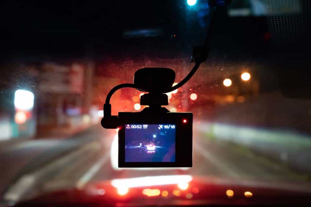 A dashcam recording at night